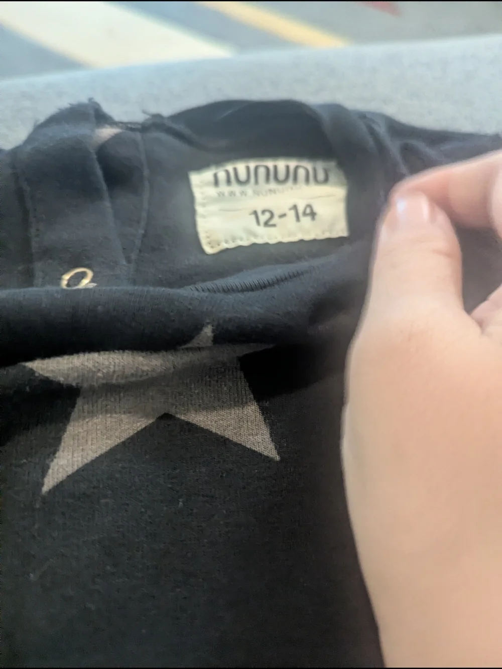 nununu Black Romper with Tan Star Print